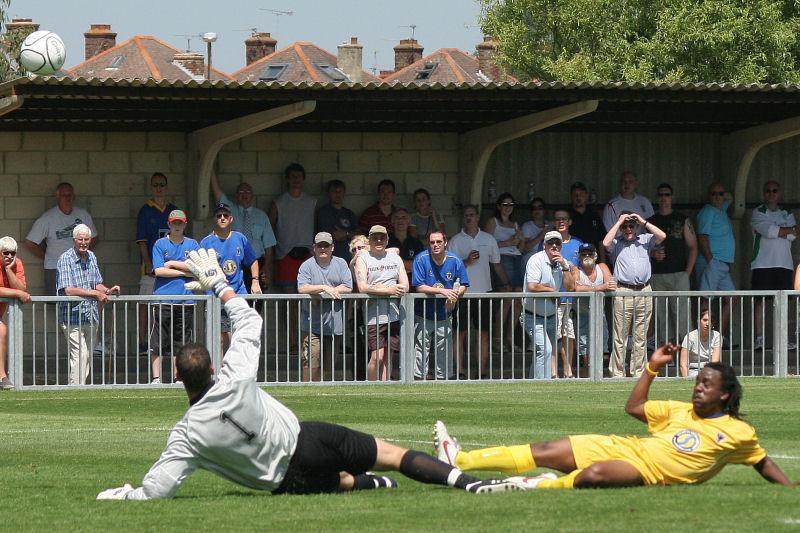 Craig Stoner stops Andy Douglas getting through
