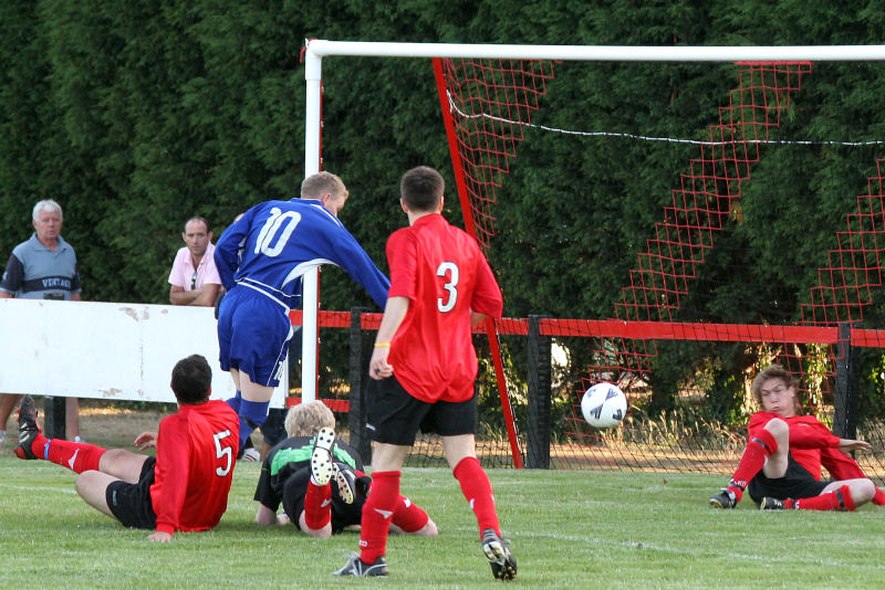 Gavin Heater blocks James Highton's shot on the line
