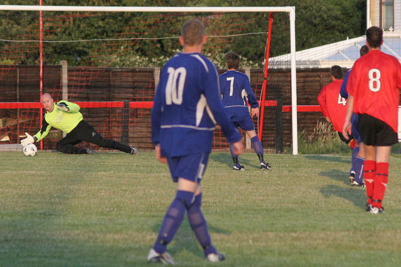 Matt Greives pushes this Wick shot round the post
