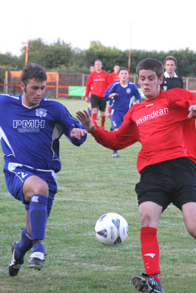 Sean Duffy and Dan Jarvis go for the ball
