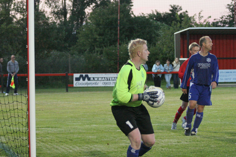 Stand in keeper Russ Tomlinson gathers safely
