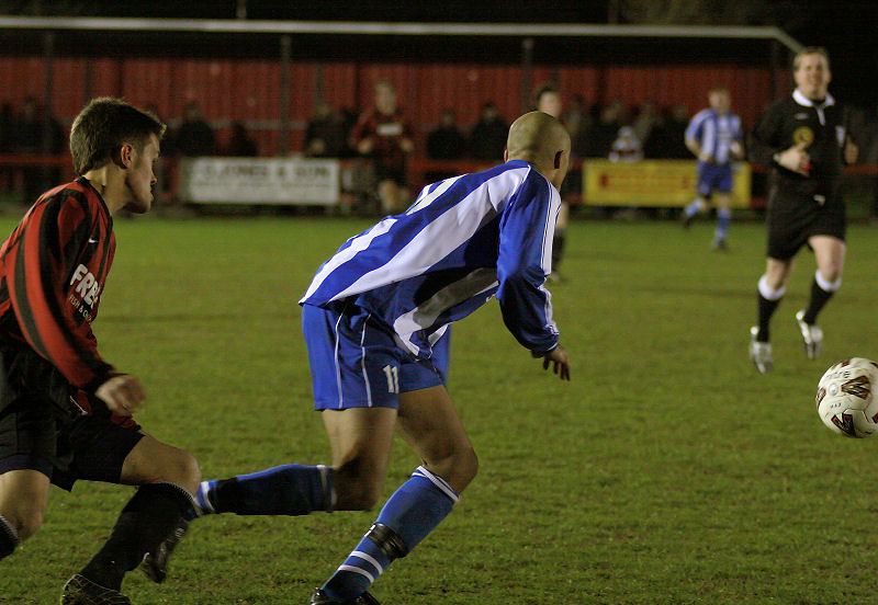 Brendan Sebuliba chased by Mark Dixon
