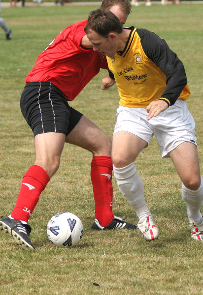 Dave Turner tussles with Marc Whiteman
