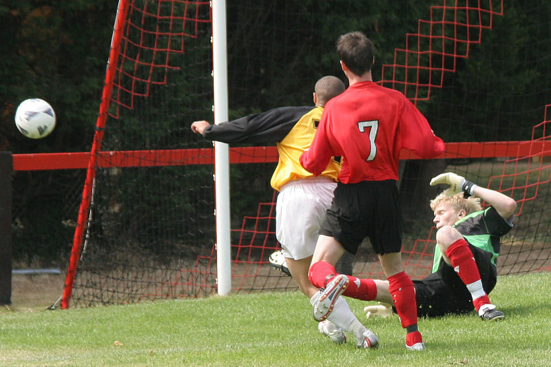 Tom Rand saves from Loui Fazakerley watched by John Spragg (7)
