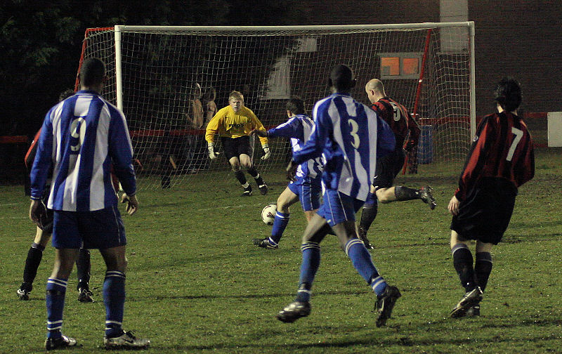 Jack McNab bursts through with a shot ...
