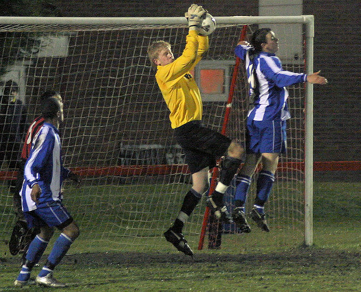 Tom Rand takes a catch under the bar
