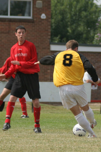 Dave Sharman closes down on a shot from Marc Whiteman (8)
