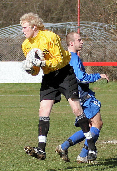 Tom Rand collects as Josh Biggs rushes in
