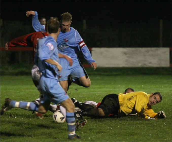 Lee Farrell goes through the Wick defence for Lewes 5th goal
