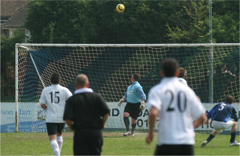 Ryan Walton (behind the 20) lifts the ball over the keeper for Jolly Boatman's 2nd
