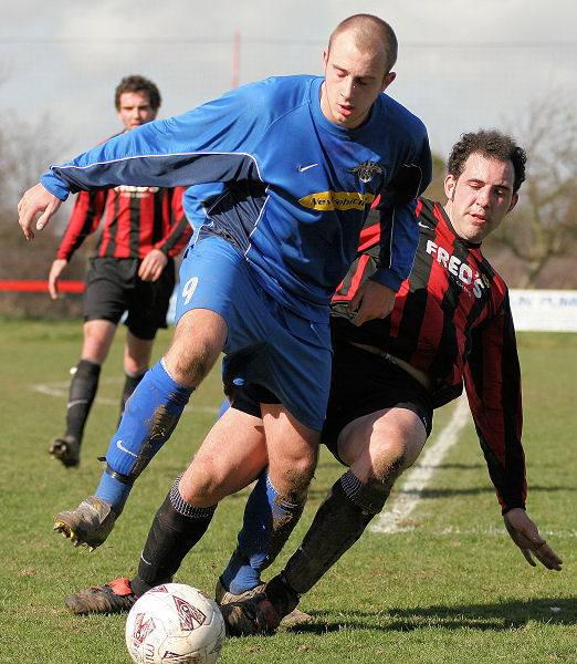 Pete Christodoulou tackles Josh Biggs
