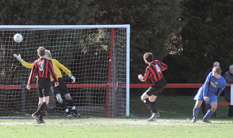 Josh Biggs heads East Preston's second goal
