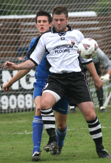 Rob Wimble chests the ball down under pressure
