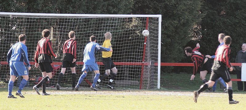 Chris Hazell's "goal" is ruled out for a push on Pete Christodoulou
