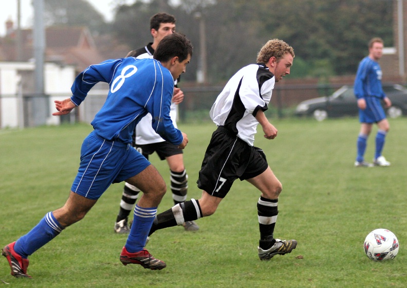 Callum Britton brings the ball away from Georgiou Alfieri
