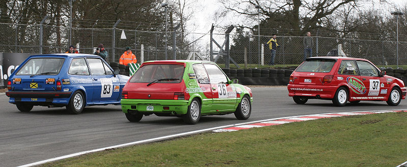 Tim Mizen Fiesta XR2i (37), Andy Barnett Peugeot 205 GTi (36) and Andy Mackie Fiesta XR2 (83)
