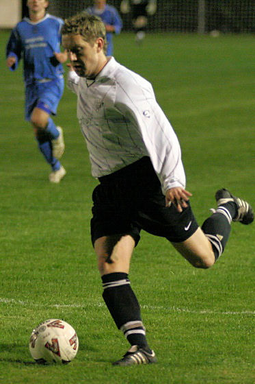 Tom Levitt lines up a shot which goes in off the far post ..
