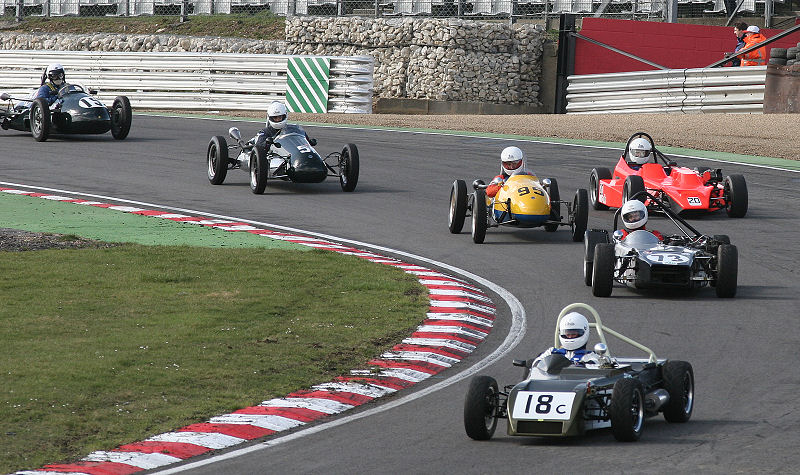 The 750 Trophy cars of eventual winner Linden Brand, JB (11), Nic Grele, Jeffrey, Neil Hodges, Cooper MkVIII (95), Paul Mason, Hague (20) Nigel Ashman, Cooper MkVI (51) and Gordon Russell, Mackson (19)
