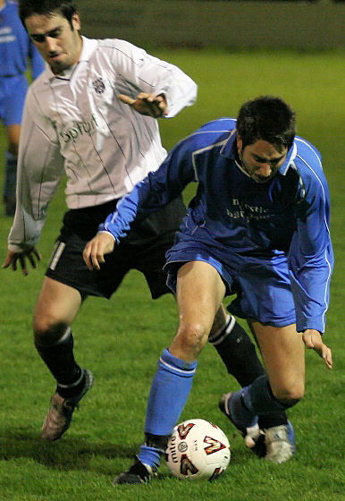 James Rhodes fouls Chris Hibberd
