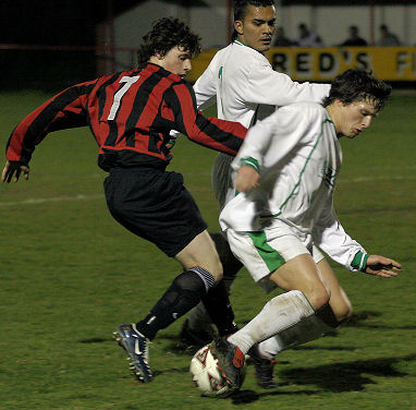 Kieron Howard breaks through on goal between Belal Miah and Scott Murfin
