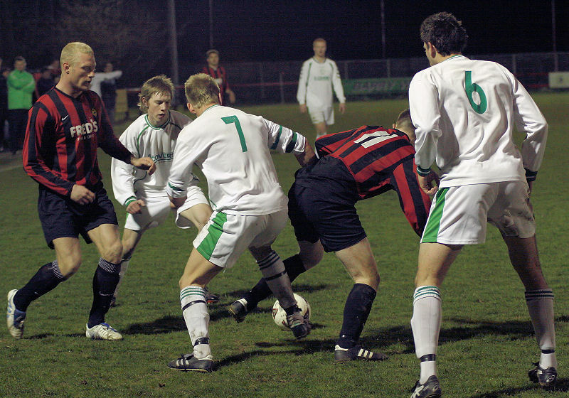 Alex Ward tackles Danny Curd 
