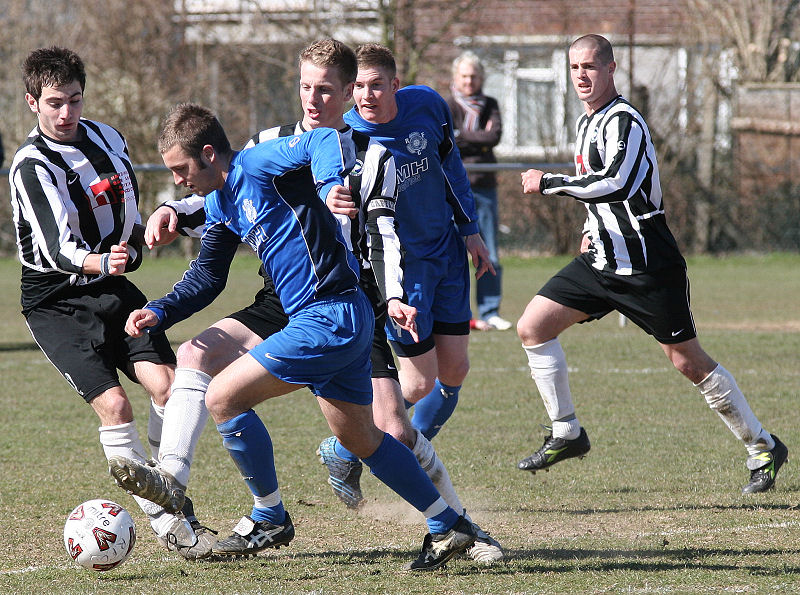 Sean Duffy goes past Dan Murray and Ashley Jones
