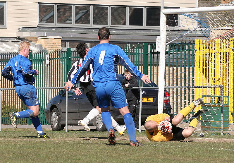 An important save by James Latter with Jamie Wright rushing in and Russ Tomlinson and Brett Neal backing up
