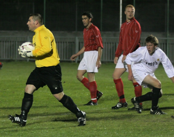 Wes Hallett breaks up an Arundel attack
