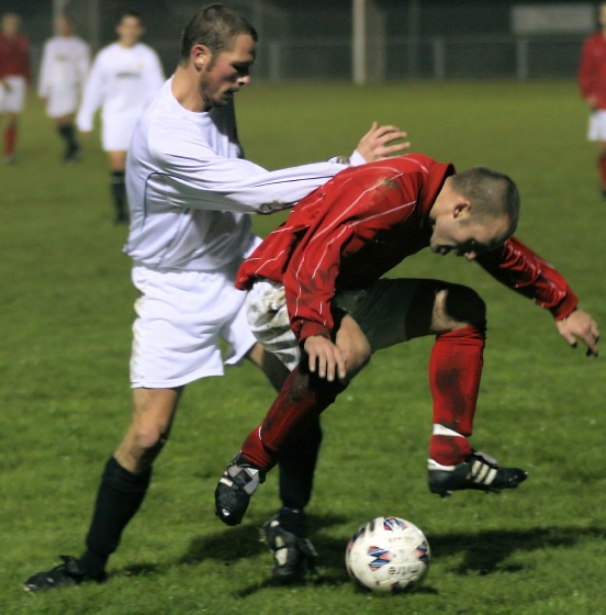 Mark McCullum tackles Matt Huckett
