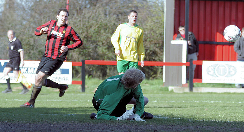 Tom Rand gets down to save this shot
