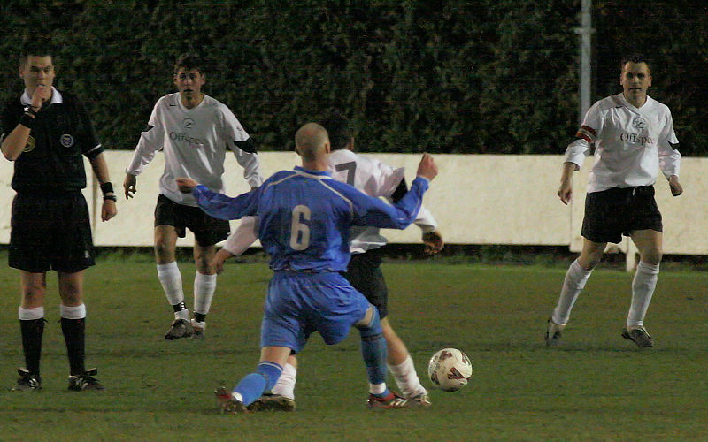 Kristian Bridle is fouled by Matt Follows
