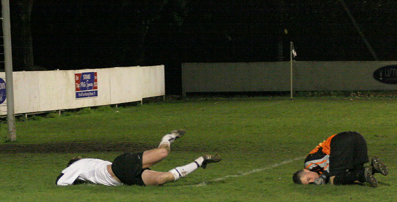 Jason Downer makes a vital stop to take the ball off the feet of Dean Leaver (?)
