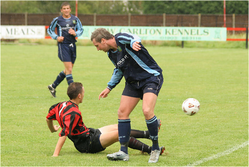 Haydn Aldred gets the ball away from Joe Clark
