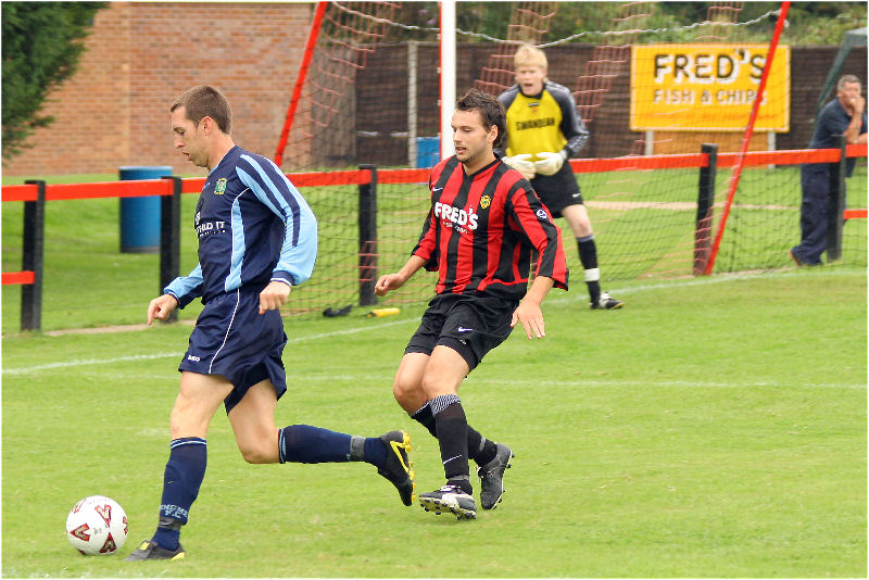 Ollie Howcroft forces Clinton Moore wide
