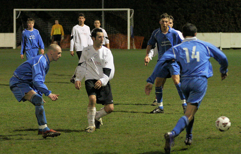 Warwick McClymont (14) gets the ball away
