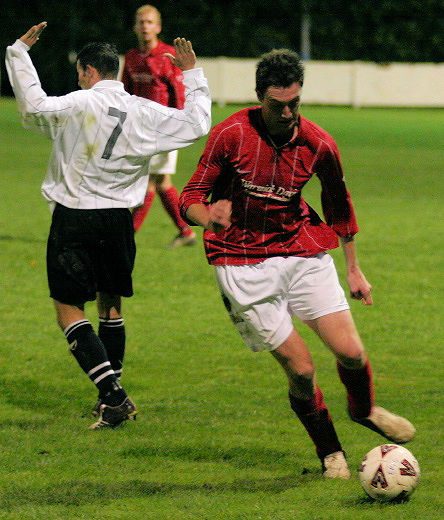 Josh Sutcliffe on the ball, not sure what Phil Churchill is doing
