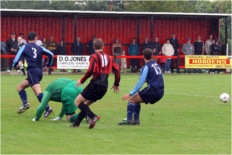 Ross Standen makes a vital stop from Danny Curd
