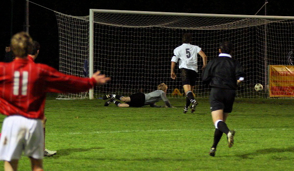 This Arundel effort goes across the face of the goal
