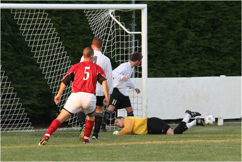 EP keeper Paul Best and Matt Axell stop a Southwick attack
