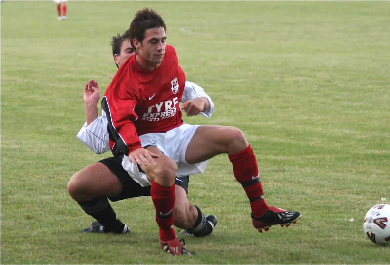 Marcus Farrell is tackled by Pete Ansley
