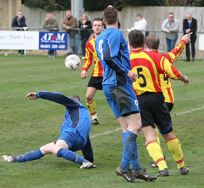 Lingfield get the ball away from James Highton
