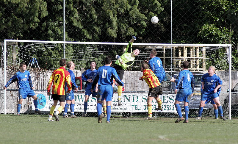 Andy McCarthy turns a shot over the bar
