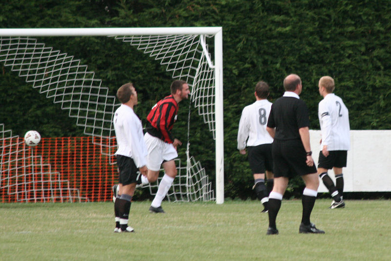 Danny Curd (out of picture) opens the scoring for Wick ...
