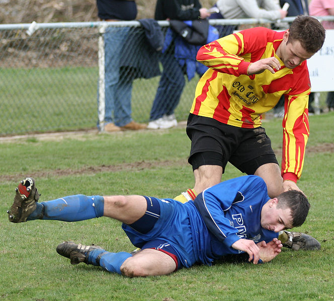 Adam Bibb gets in a strong tackle
