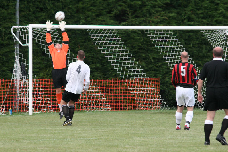 Paul Best reaches for this Wick effort
