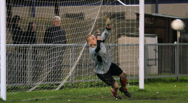 John McBride goes the right way but cannot reach Richard Carter's 3rd penalty for Shoreham on 90 minutes
