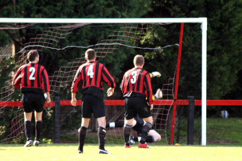 With only 9 minutes to go Ollie Howcroft (2) Chris Morrow (4) and Lee Howard (3) can only watch as Tom Rand is finally beaten by a Dave Walker shot which goes in off Tony Miles
