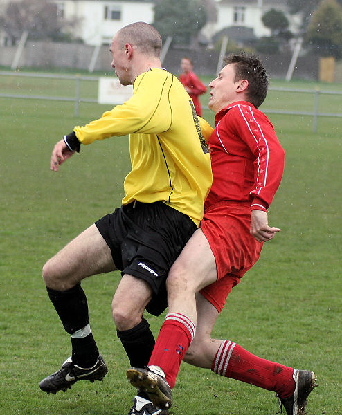 James West is tackled by Jamie Sinclair
