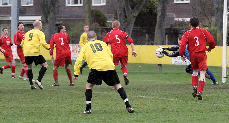 Dan Kelton cuts out a cross
