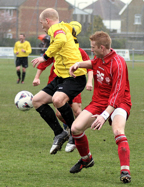 Steve Davies is challenged by Stuart Channon
